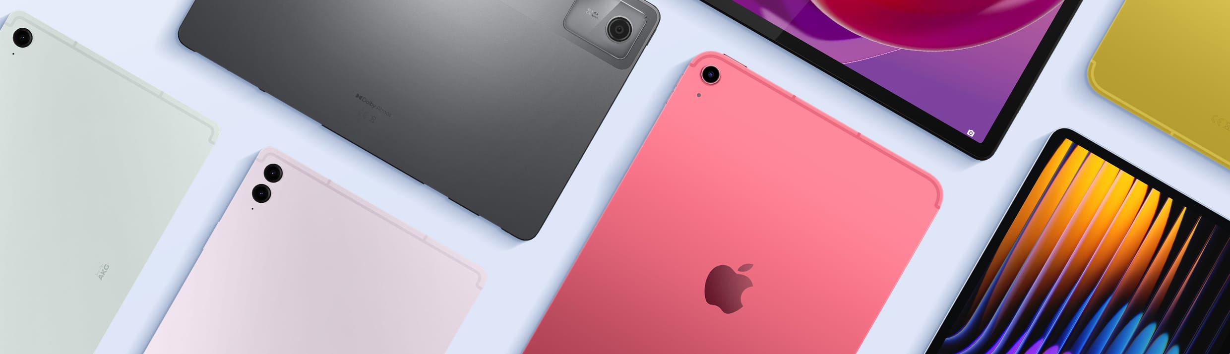 Plusieurs tablettes sur un fond bleu clair.