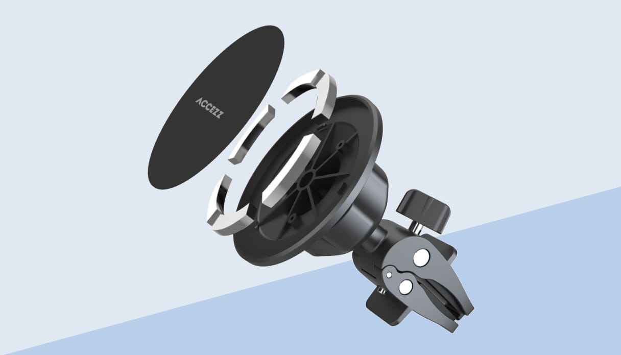 Une photo d’un support magnétique pour téléphone, démonté pour illustrer son fonctionnement.