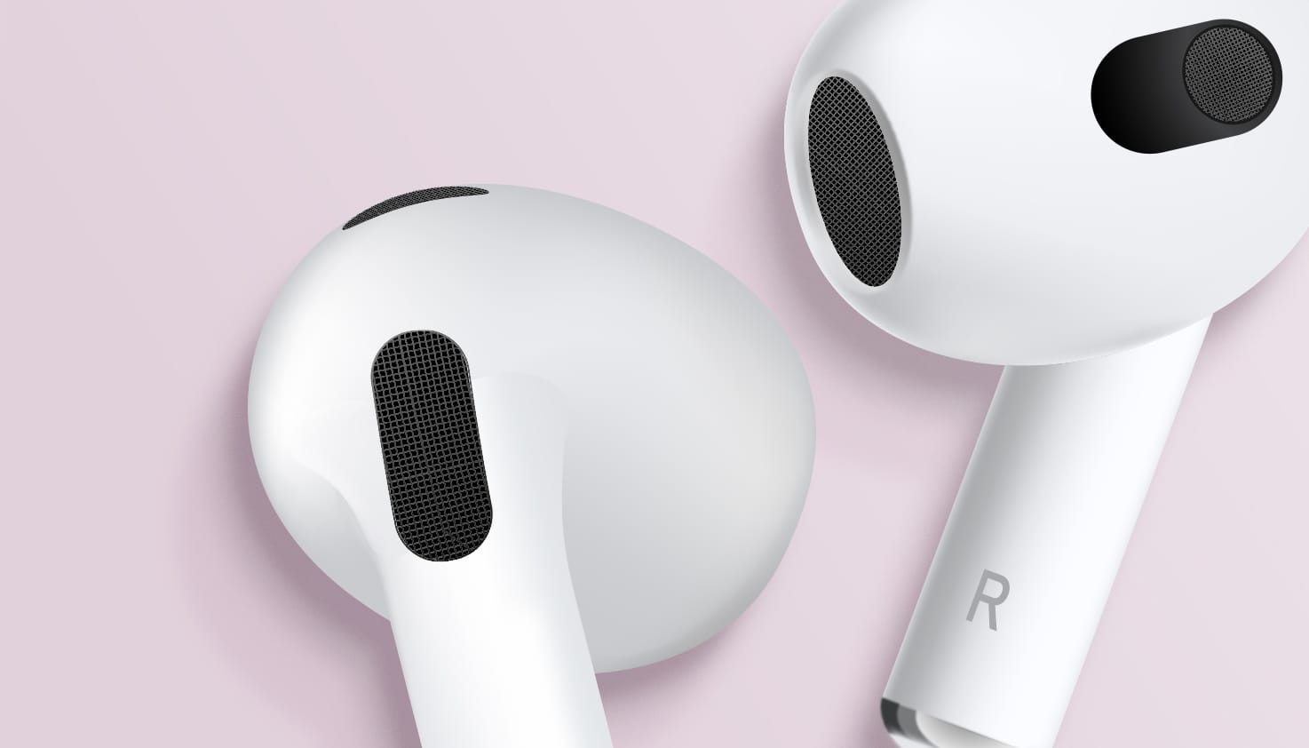 Les Apple AirPods de 4e génération sont zoomés sur les haut-parleurs.