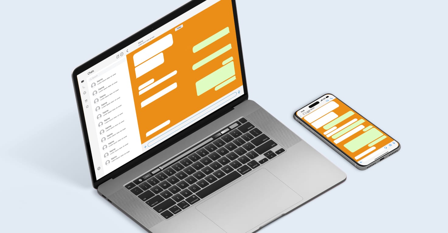 Un ordinateur portable et un téléphone où WhatsApp est ouvert.